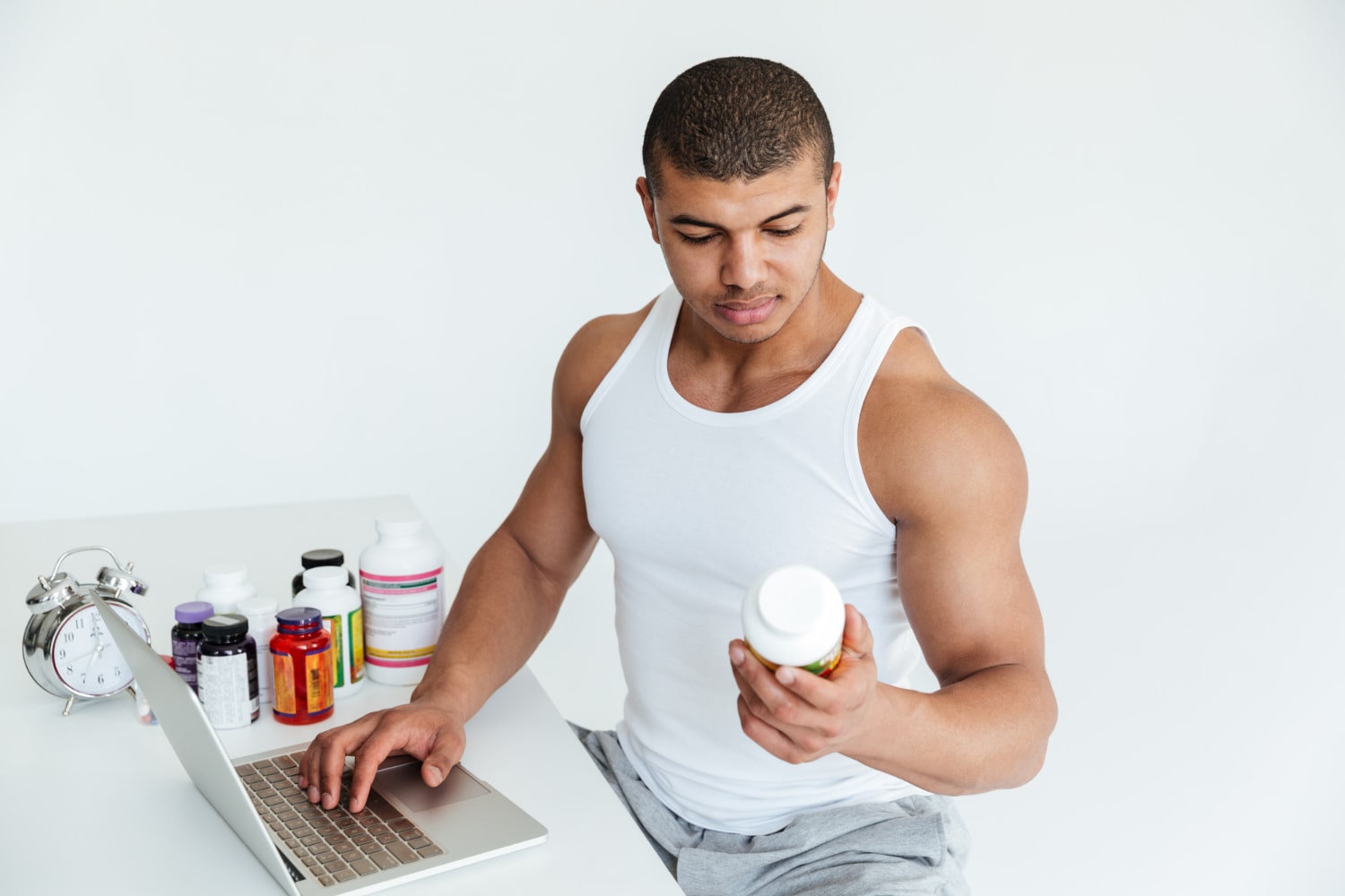 Man researching supplements, exploring benefits of Lion's Mane for testosterone